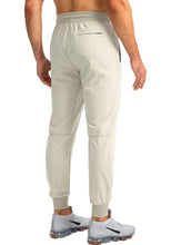 Load image into Gallery viewer, Pudolla Men's Lightweight Tapered Jogger Pants with Zip Pockets – Quick-Dry Athletic Running Joggers in Khaki