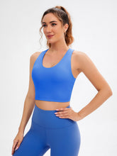 Load image into Gallery viewer, JOYSPELS Sports Bras for Women Extra Comfort Criss-Cross Back Padded Workout Tops for Women Medium Support