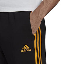 Load image into Gallery viewer, adidas Men's Essentials Fleece Tapered Cuff 3-Stripes Pants, Black/Semi Solar Gold, X-Small
