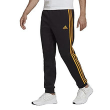 Load image into Gallery viewer, adidas Men's Essentials Fleece Tapered Cuff 3-Stripes Pants, Black/Semi Solar Gold, X-Small