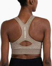 Load image into Gallery viewer, New Balance Women's Seamless MID Impact Heather Keyhole Sport Bra with Removable Pads, Chocolate Brown
