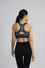 Load image into Gallery viewer, New Balance Women's Seamless MID Impact Heather Keyhole Sport Bra with Removable Pads, Pigment
