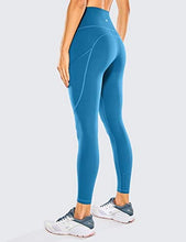 Load image into Gallery viewer, CRZ YOGA Women's Naked Feeling Workout Leggings 25 Inches - High Waisted Yoga Pants with Side Pockets Carbon blue
