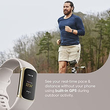 Load image into Gallery viewer, Fitbit Charge 5 Advanced Fitness &amp; Health Tracker with Built-in GPS, Stress Management Tools, Sleep Tracking, 24/7 Heart Rate and More, Lunar White/Soft Gold, One Size (S &amp;L Bands Included)

