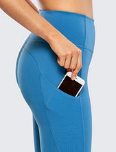 Load image into Gallery viewer, CRZ YOGA Women's Naked Feeling Workout Leggings 25 Inches - High Waisted Yoga Pants with Side Pockets Carbon blue
