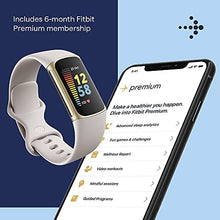 Load image into Gallery viewer, Fitbit Charge 5 Advanced Fitness &amp; Health Tracker with Built-in GPS, Stress Management Tools, Sleep Tracking, 24/7 Heart Rate and More, Lunar White/Soft Gold, One Size (S &amp;L Bands Included)

